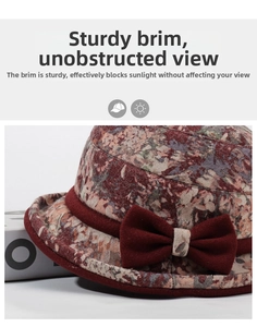 Detail of red floral bucket hat with velvet bow and stiff brim for autumn and winter