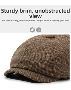 Detail of a brown newsboy cap brim showing firm structure and breathable woven texture