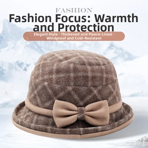 Detail view of winter plaid bucket hat with bow accent and thick fleece lining