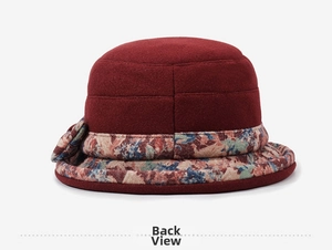 Detail view of the back of a deep red wool bucket hat with floral trim for elderly women