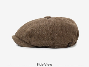 Side view detail of coffee brown tweed newsboy cap showing textured fabric and metal pin