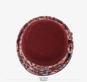 Top view of retro printed bucket hat for elderly women with wine red wool texture