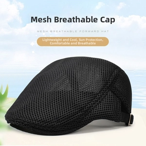 Close-up of black breathable mesh fabric texture on a summer flat cap beret