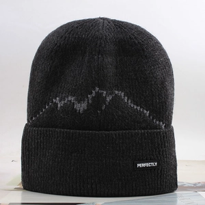 Winter thermal knit beanie in dark grey featuring mountain pattern and perfectly label
