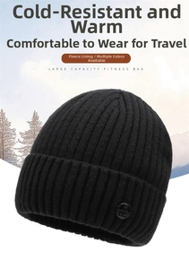 Detail of black knitted beanie featuring thick fleece lining and round metal RC logo