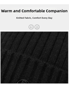 Close-up of black ribbed knit winter hat featuring a premium metal brand logo detail