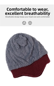 Detail view of winter knit ear protection hat with plush grey top and burgundy ribbed brim