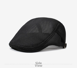 Detail view of the breathable black mesh fabric and adjustable metal buckle on the flat cap