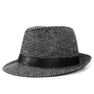 Classic black and white tweed fedora hat with a black satin band for autumn and winter