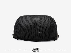 Detail view of the breathable mesh back with adjustable gold buckle on the black beret cap
