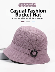Close-up of purple floral bucket hat with cotton-linen texture and black flower buckle