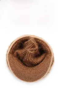 Close-up of brown knit hat showing thick thermal plush lining and texture