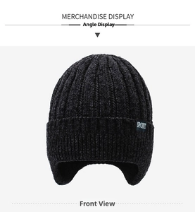 Close-up of winter knit beanie showing thick chenille fabric and SPORT label