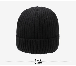 Detail view showing the ribbed knit texture and back side of the black winter beanie hat