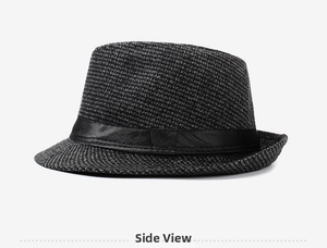Detailed side view of a gray woven jazz fedora hat featuring a classic black ribbon band