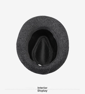 Detailed interior view of a mixed fabric fedora featuring black lining and sweatband