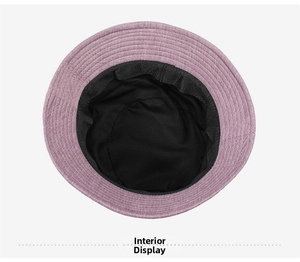 Interior view showing neat stitching and black fabric lining of purple corduroy bucket hat