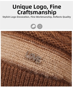 Macro detail of striped knit beanie with a rhinestone-studded metal LOVE pendant