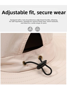 Close-up of adjustable elastic buckle and breathable metal eyelets on beige sun hat