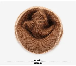 Detail view of the warm plush fleece lining inside the brown winter knit hat for women