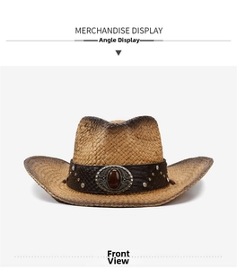 Détail d'un chapeau de cowboy en paille avec bande de cuir brun et pierre rouge ovale