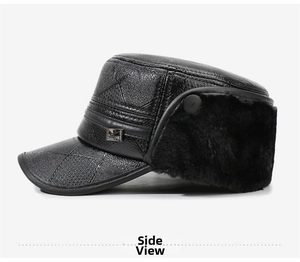 Detail view of winter black leather flat cap with quilted stitching and plush ear flaps