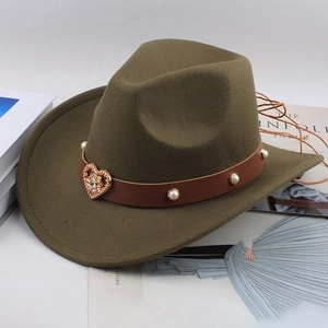 Detail of army green wool fedora with leather band, heart rhinestones and pearl studs