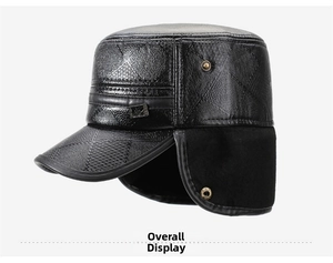 Detail of winter flat cap with ear flaps and diamond quilted faux leather texture