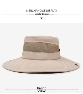 Close-up of beige sun hat with breathable mesh crown and wide brim details
