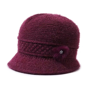 Women's burgundy knit hat with faux fur flower and rhinestones for autumn winter