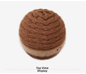 Top view of brown knitted winter hat for women with thick wave texture and metal detail