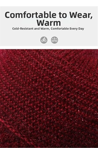 Macro shot of dark red knit fabric with metallic gold thread and warm textured weave