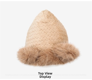 Detailed view of winter plush hat featuring thick faux fur trim and wavy knit texture