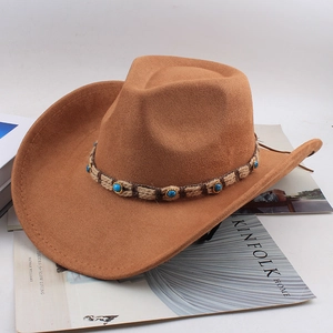 Detail of brown western cowboy hat with woven band and blue turquoise beads decoration