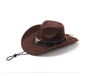 Detail of brown western cowboy hat with silver ox head buckle and woven band trim
