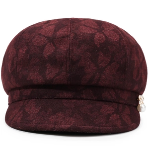 Deep red floral jacquard newsboy hat with gold butterfly and pearl charm detail
