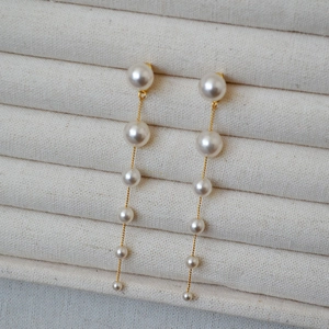 Elegant 925 silver long tassel earrings with gradient pearls on a gold-plated chain