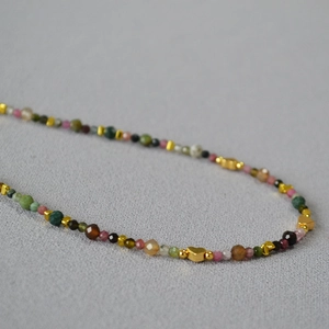 Colorful tourmaline heart beaded necklace with elegant gold metallic accents for women