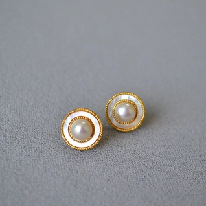 Elegant gold round stud earrings with white mother of pearl and freshwater pearl center