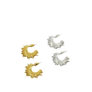 Modern geometric C-shaped sunburst earrings in gold and silver finish on white background