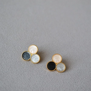 Three-disk enamel stud earrings with vintage beaded gold trim in black, pink, and white