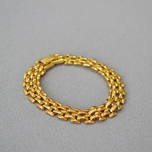 Chunky gold-plated wide woven chain bracelet with secure fold-over clasp for women
