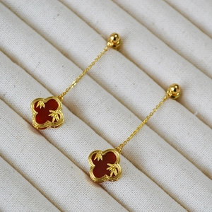 Chinese style long clover drop earrings with red agate and bamboo relief in gold finish
