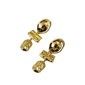 Irregular textured gold lava earrings in a modern geometric linked brass design
