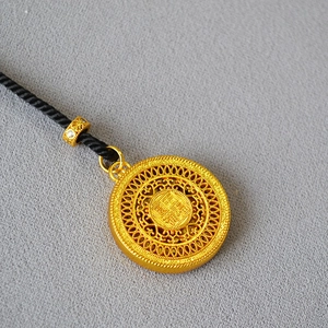 New Chinese style hollow round gold pendant necklace with intricate filigree and black cord
