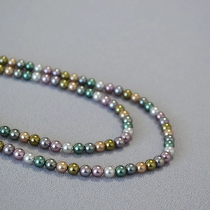 French vintage style necklace with colorful pearls and tourmaline beads in multiple shades