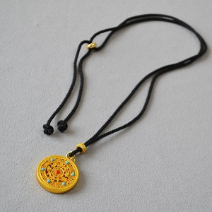 Hollow gold-plated Five Blessings medallion necklace with red bead and turquoise accents