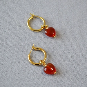 Elegant gold hoop earrings with red heart-shaped agate pendants for women's fashion