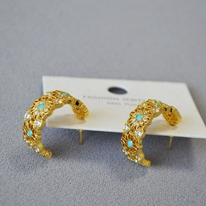 Vintage gold hollow lace hoop earrings with turquoise and white zircon accents