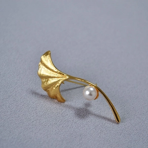 Ginkgo leaf brooch in gold finish with a white round pearl for sweaters and coats